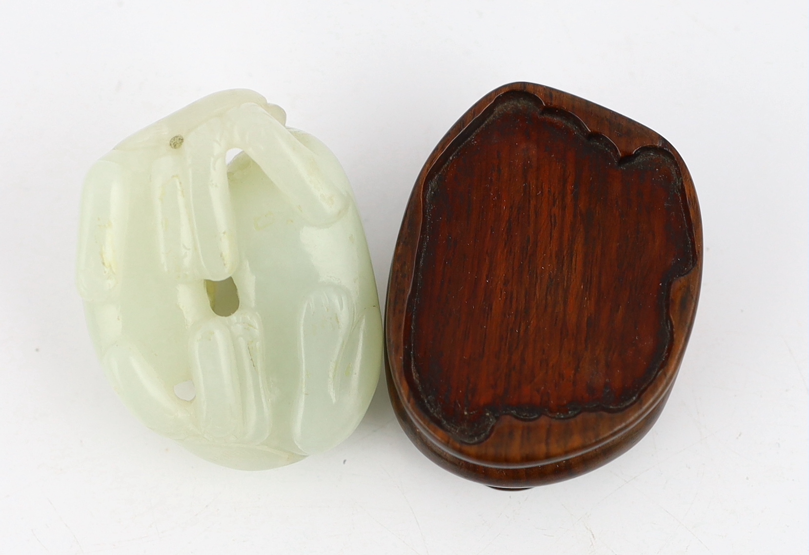 A Chinese pale celadon jade group of two badgers, 18th/19th century